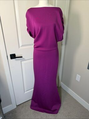 Boatneck dress in a Deep Purple/ Plum color.
